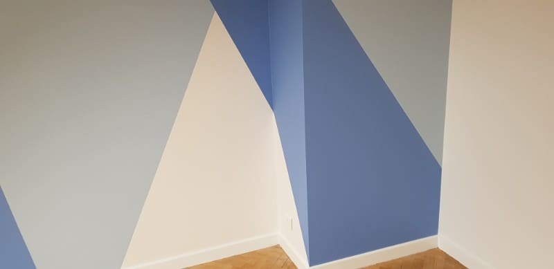 Mur peinture géométrique bleu